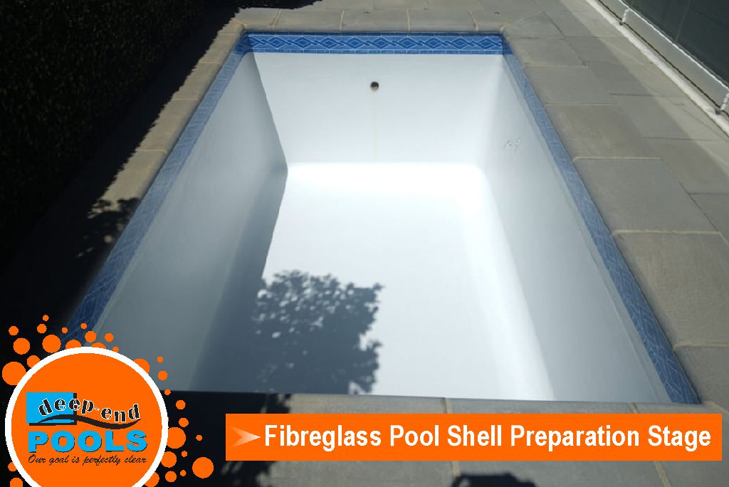 deep-end-pools-val-de-vie-small-fibreglass-pool-shell-preparation-stage Empty fibreglass pool shell during surface preparation for premium refibreglassing at Val de Vie Estate by Deep-End Pools