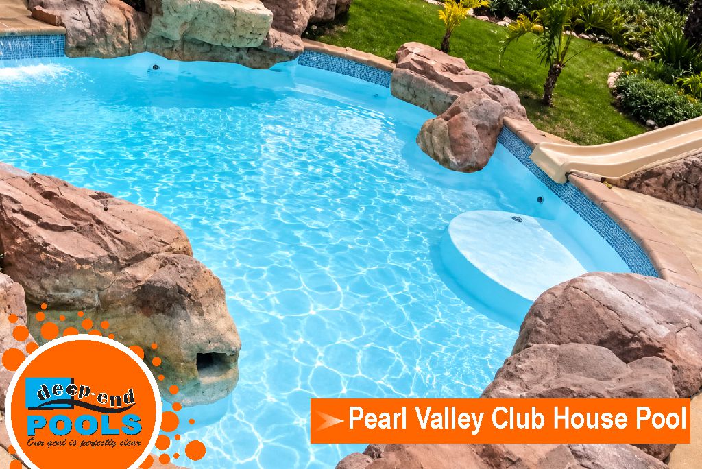 pearl-valley-clubhouse-pool-fibreglass-resurfacing Refinished Pearl Valley Clubhouse pool with sparkling blue water after fibreglass resurfacing – Completed by Deep End Pools in Cape Winelands